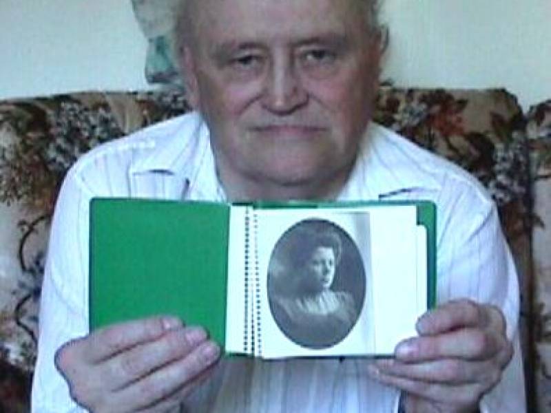 dennisgesellholdinghismotherspicture.jpg