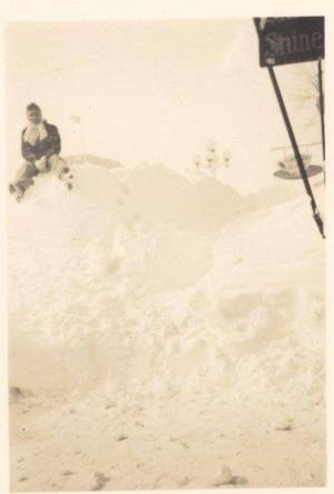 Taken in front of Mitchells and Shoe Shine Store, on North side of 4th st, between 12th ave and 13th ave.